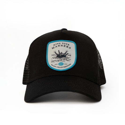 MINE YOUR MANNER TRUCKER HAT